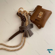 چارم بک هرمس عسلی با پاپیون Hermes-8443-L